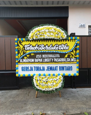 Papan Bunga Duka di Bato